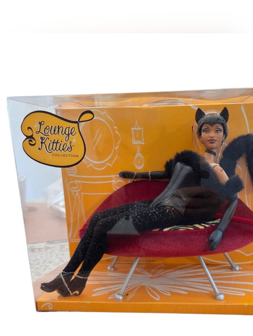 Lounge Kitties Black Doll on Red Chaise Lounge